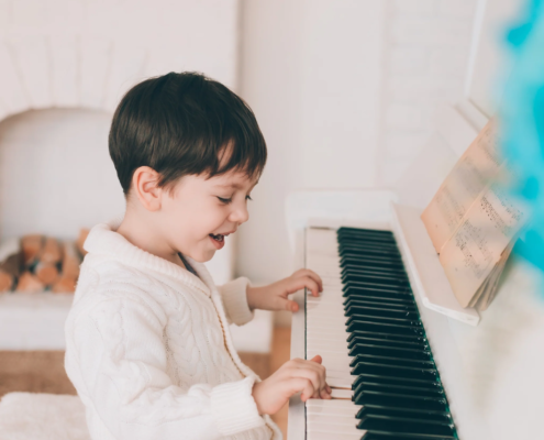 Encourage your child to play with the piano before starting lessons